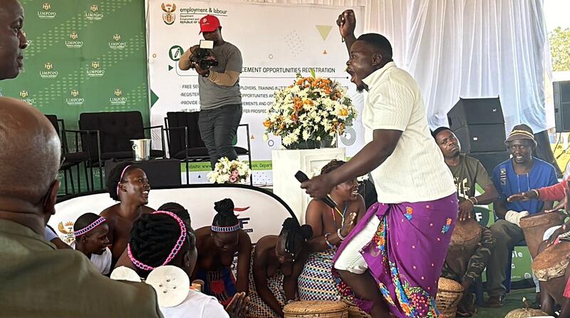A Department of Employment and Labour event in Limpopo with traditional drummers and provincial government signage.